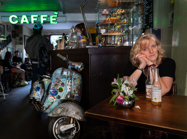 Ally inside Scooter Caffe after a long day of photographing a secret place in London