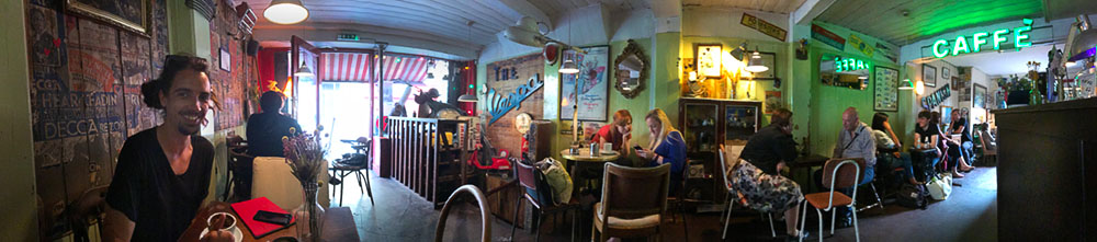 Coffee with Jethro (left) in the pan of the interior of the Scooter Caffe, Waterloo, London