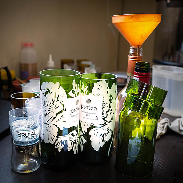 cut bottles to upcycle at Hillcrest aids centre