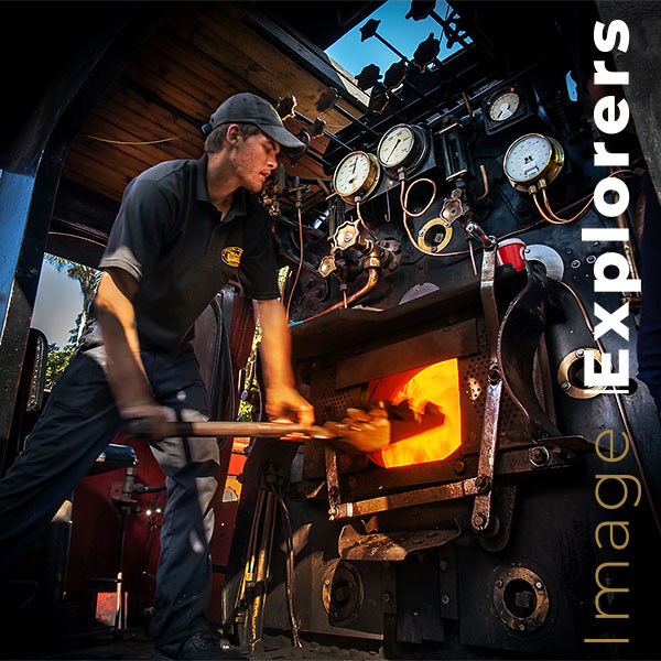 in the train cab with fireman