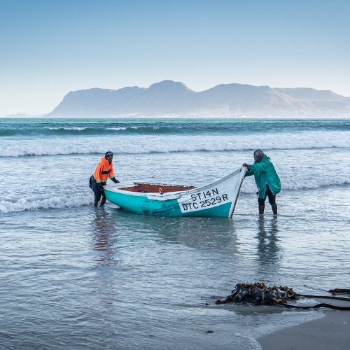 Fisherman at dusk Muizenberg