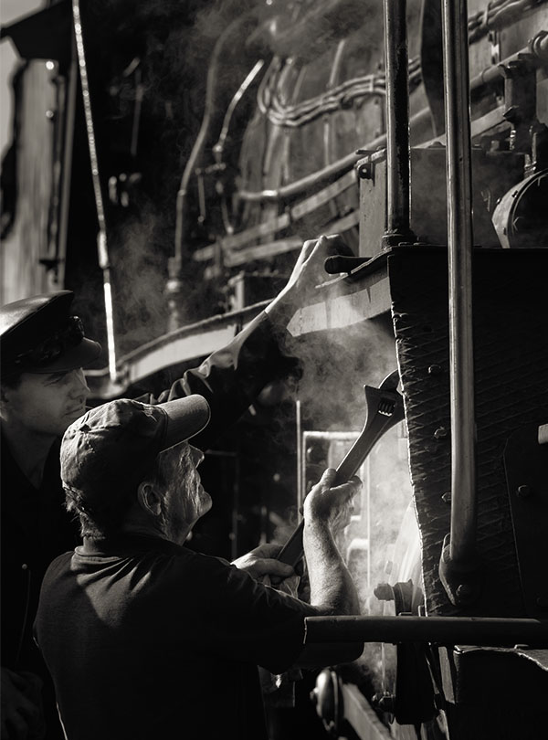 engineer fixing train
