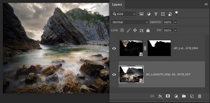 Layer masks hide foreground and show dark sky layer
