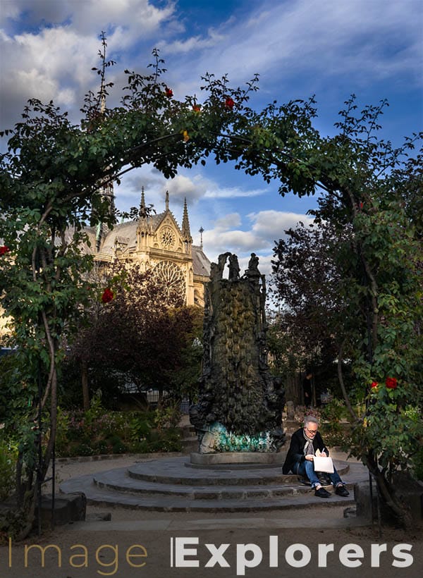 Square René Viviani with Notre Dame and artist