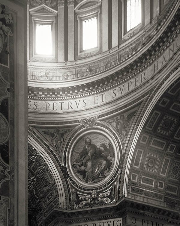 St Peters Vatican City with light beam in low light interior